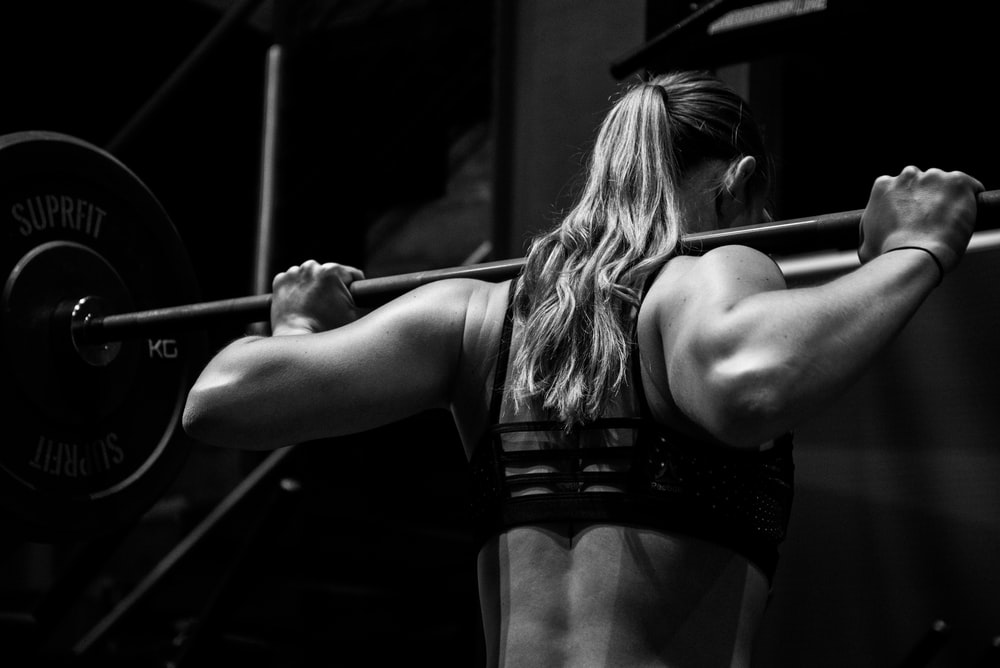 girl lifting weights